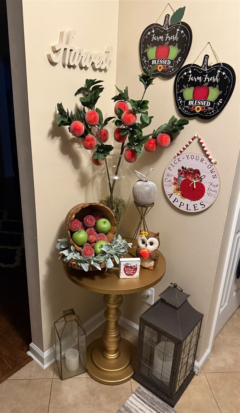 Harvest wall display with apples and farm fresh signage